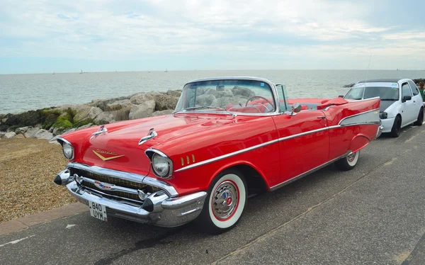 Classic Red Chevrolet Belair convertible on show on Felixstowe seafront.