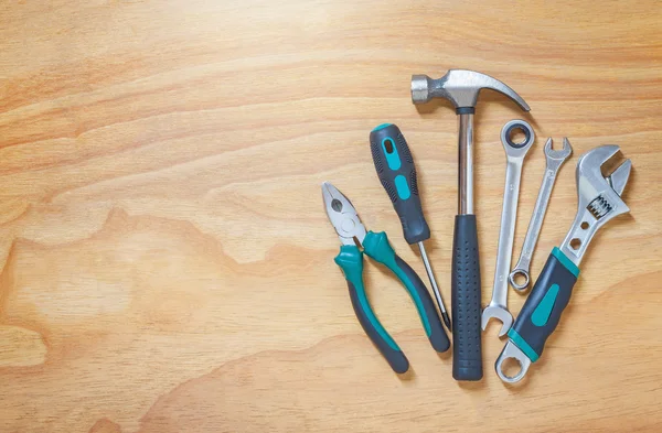 Tools on a wooden background. soft lighting