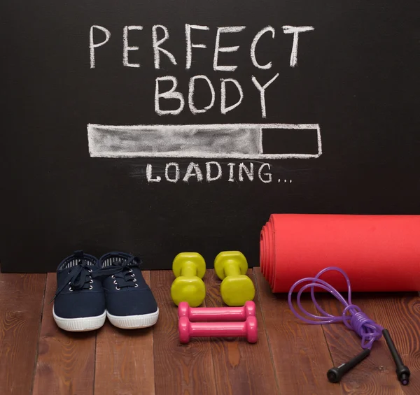 Sport accessories in front of chalk desk