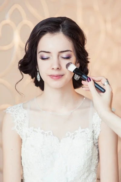 Wedding make-up of the bride