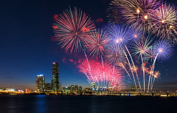 Colorful fireworks and Seoul City at Night , South Korea.