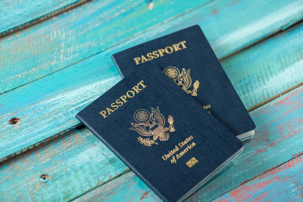 American passports on a distressed blue background