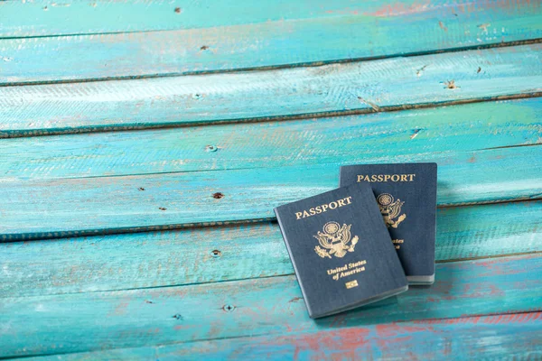 American passports on a distressed blue background