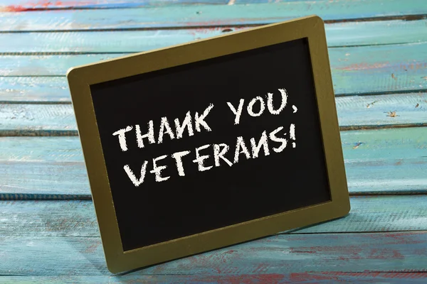 Veterans day chalk sign on wood background