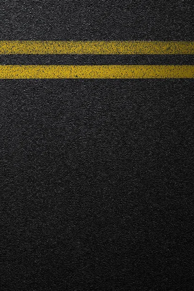 Level asphalted road with a dividing yellow stripes. The texture of the tarmac, top view.