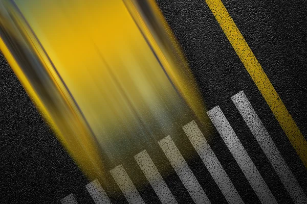 Level asphalted road with a dividing stripes, pedestrian crossing and moving with high speed a yellow car. The texture of the tarmac, top view.