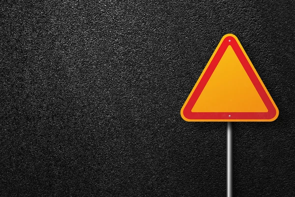 Road signs of the triangular shape on a background of asphalt. The texture of the tarmac, top view.