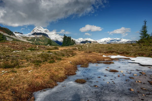 Clear waters with distant mountains