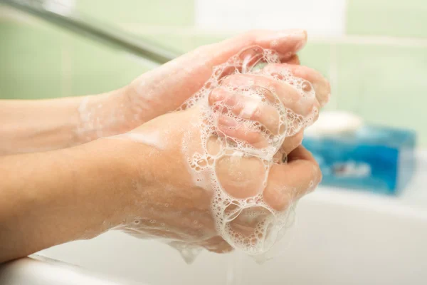 Hygiene. Cleaning Hands. Washing hands with soap and water.