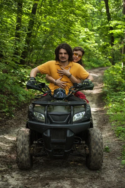 Couple on four-wheeler ATV