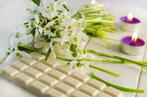 Wine, white chocolate and flowers