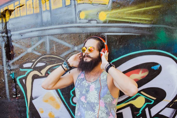 Guy with  listening  music with headphones