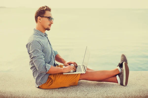 Young man working on laptop