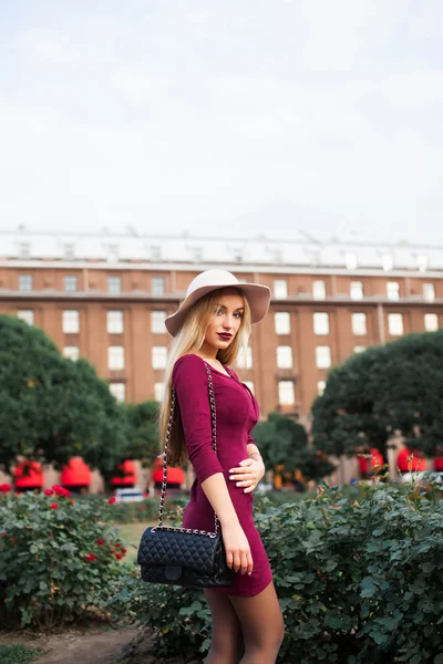 Fashionable girl with red lips