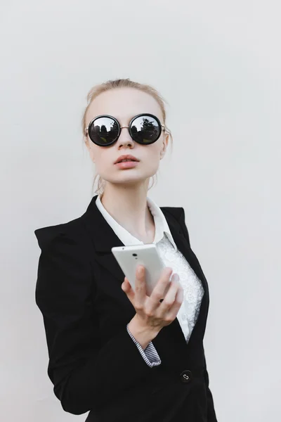 Fashion blonde girl with sunglasses