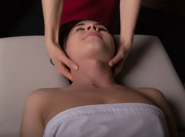 Masseur doing massage on woman body in the spa salon. woman relaxed. Beauty treatment concept