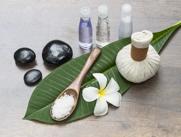 Spa massage compress balls, herbal ball on the leaves with rock spa, Thailand, select focus