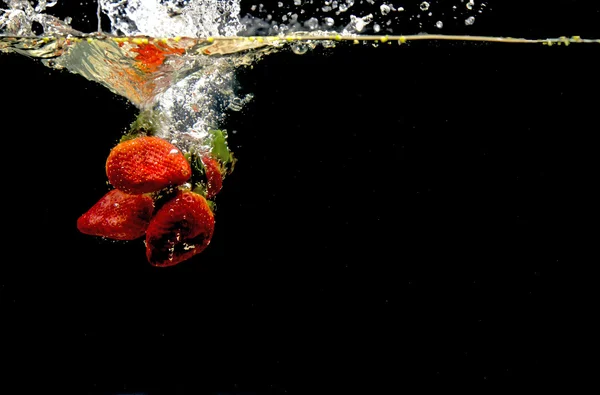 Photo of a fruits dropped under water