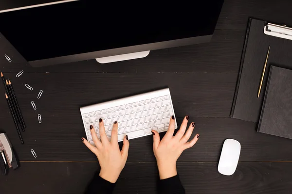 Woman working  at the computer