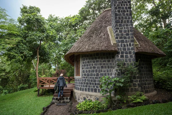 Tourist entering in room of Mikeno Logde