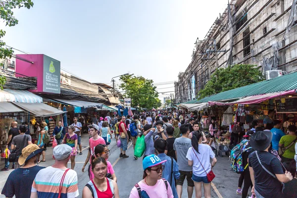 Tourist people in open street market