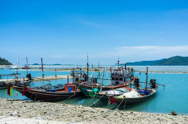 Traditional fisherman boats anchored in beach