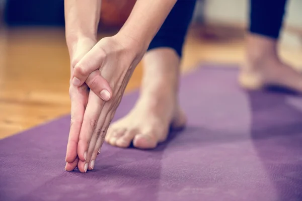 Female yoga hands