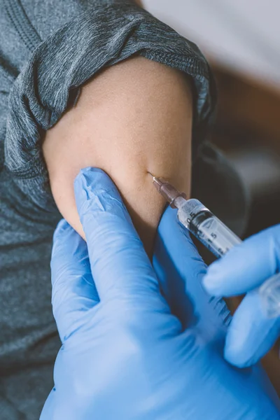 Little boy receives a vaccination