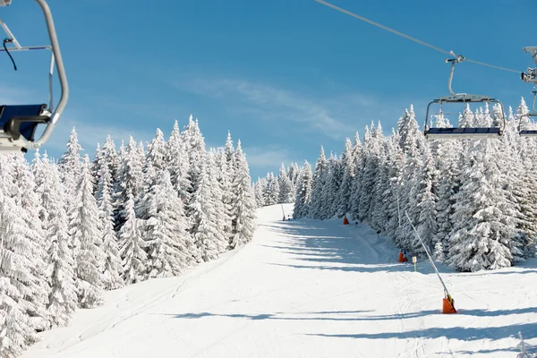 Ski slope with ski lifts