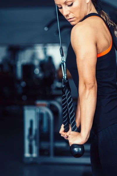 Female doing triceps exercise