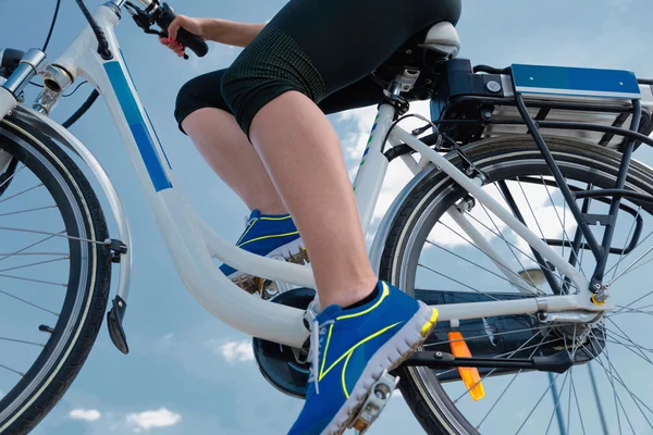 Female Riding e-bike