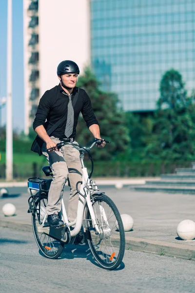 Male Office worker using e-bike