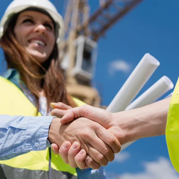 Construction business deal handshake