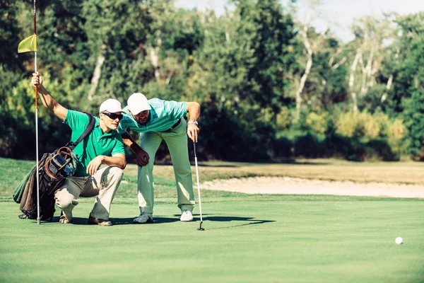 Male golfers chatting