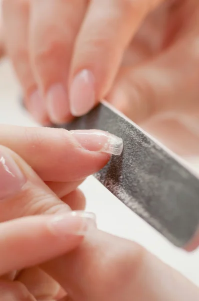 Using nail file Manicure  treatment
