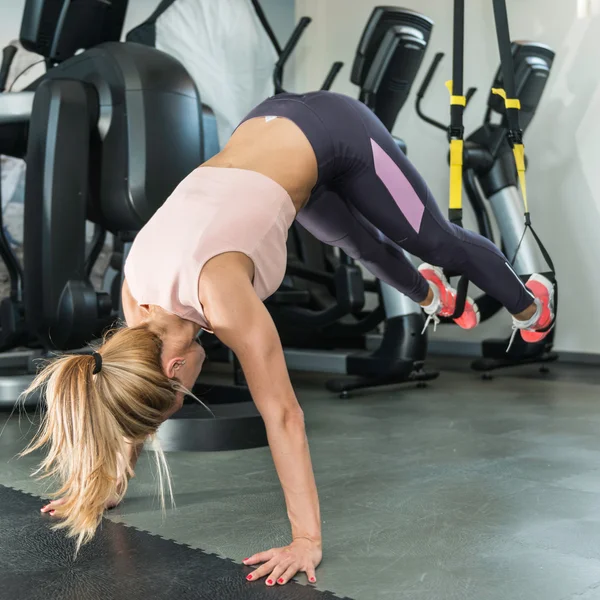 Female athlete at TRX Suspension Training