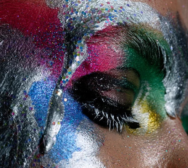 Creative make up with splashes of color. Body ert