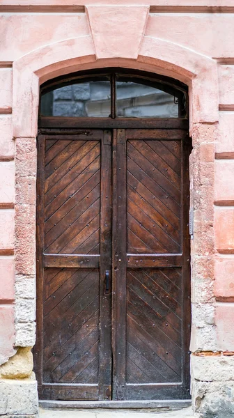 Old wooden door, the city of Lviv.