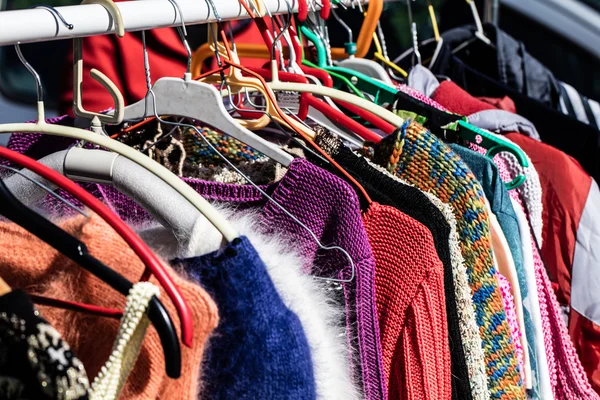 Colorful women\'s sweaters for second life at flea market