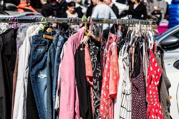 Pink and red fashion female clothes at street fair