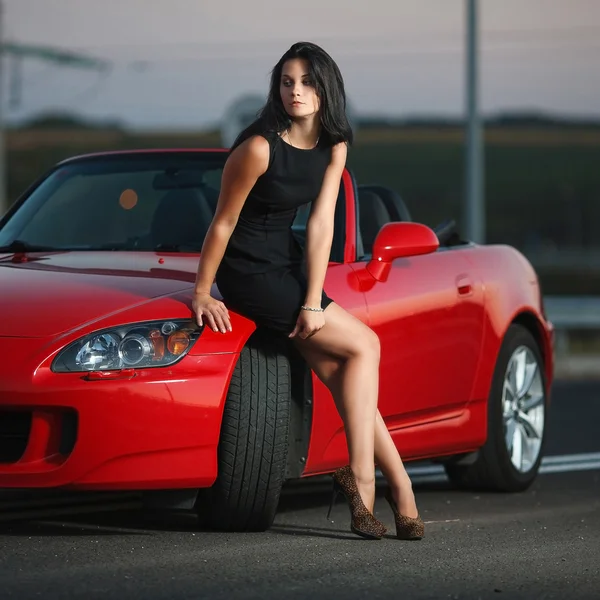 Attractive beauty sexy woman portrait with car