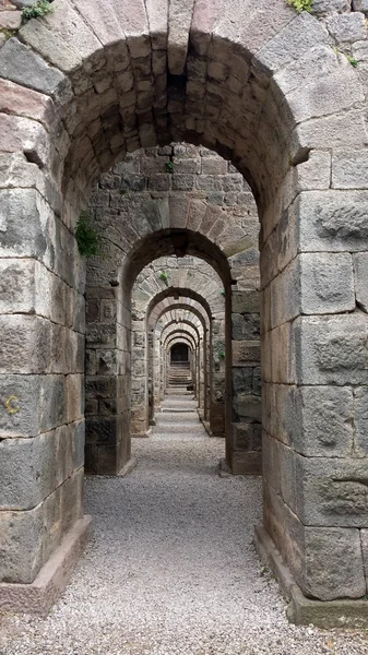 Stone arched corridor