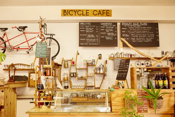 Coffee shop with bicycle on wall interior