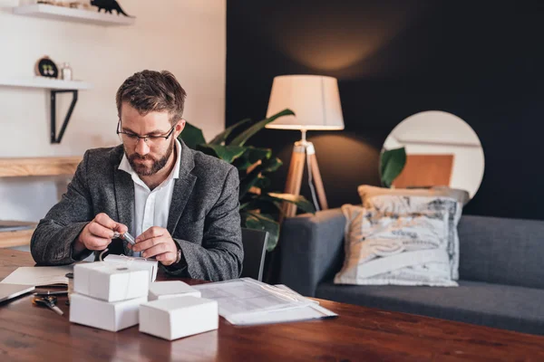 Entrepreneur preparing packages for delivery to customers