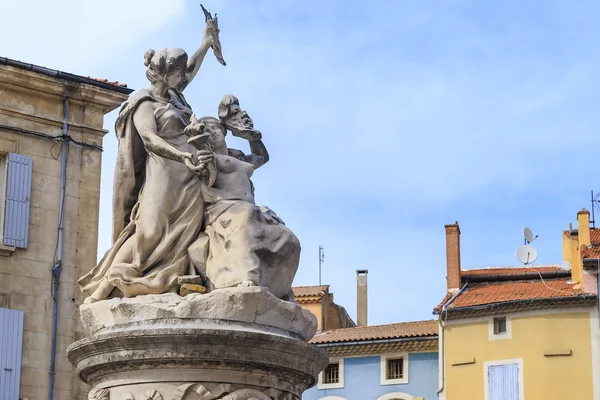 Statue in front of ancient Roman theater in Orange, France