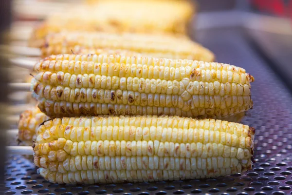 Grilled corns on stick