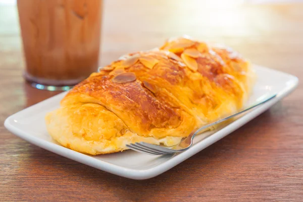 Almond croissant breakfast with cold chocolate drink