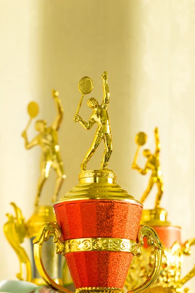 Badminton gold color trophies