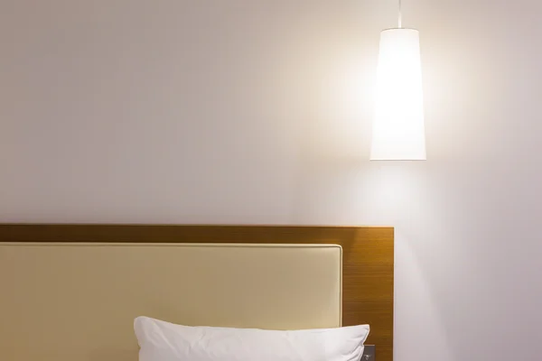Bed headboard and lamp
