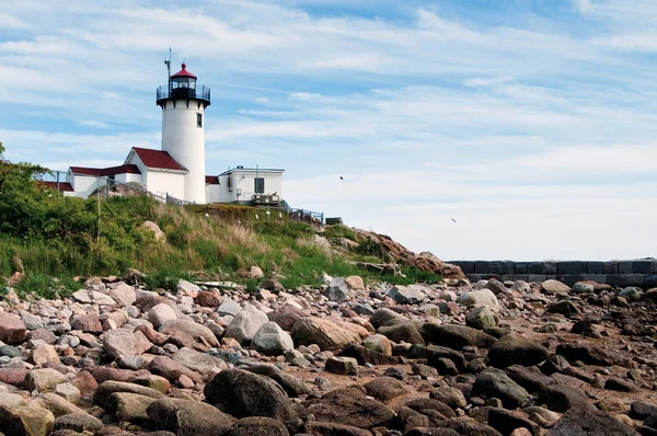 Gloucester Lighthouse Over Rocky Shore in Massachusetts